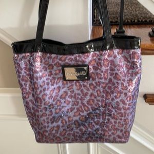 This is a blue/purple leopard sequin tote bag! Very good condition!